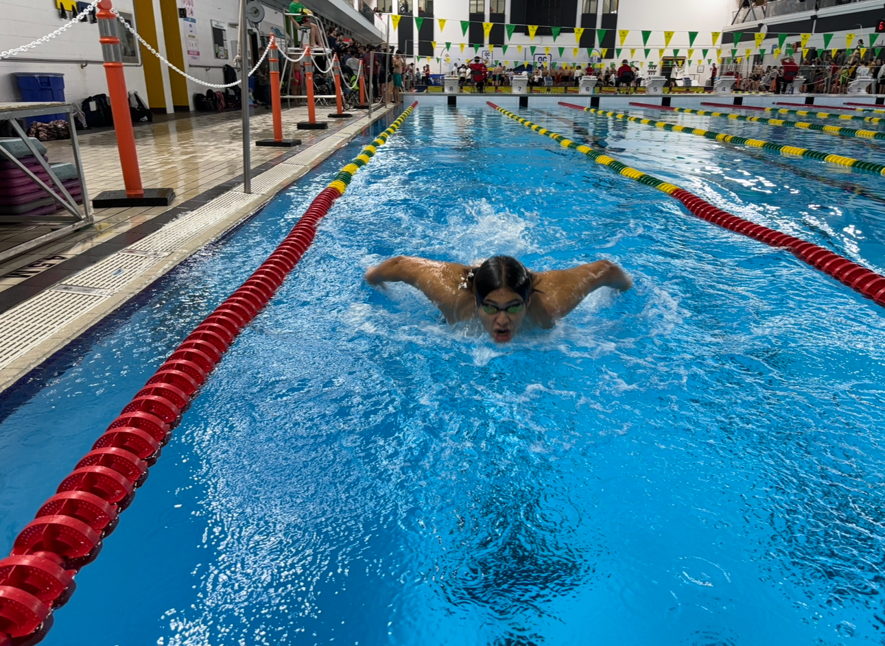 Swimmer swimming butterfly at the University de Sherbrooke pool